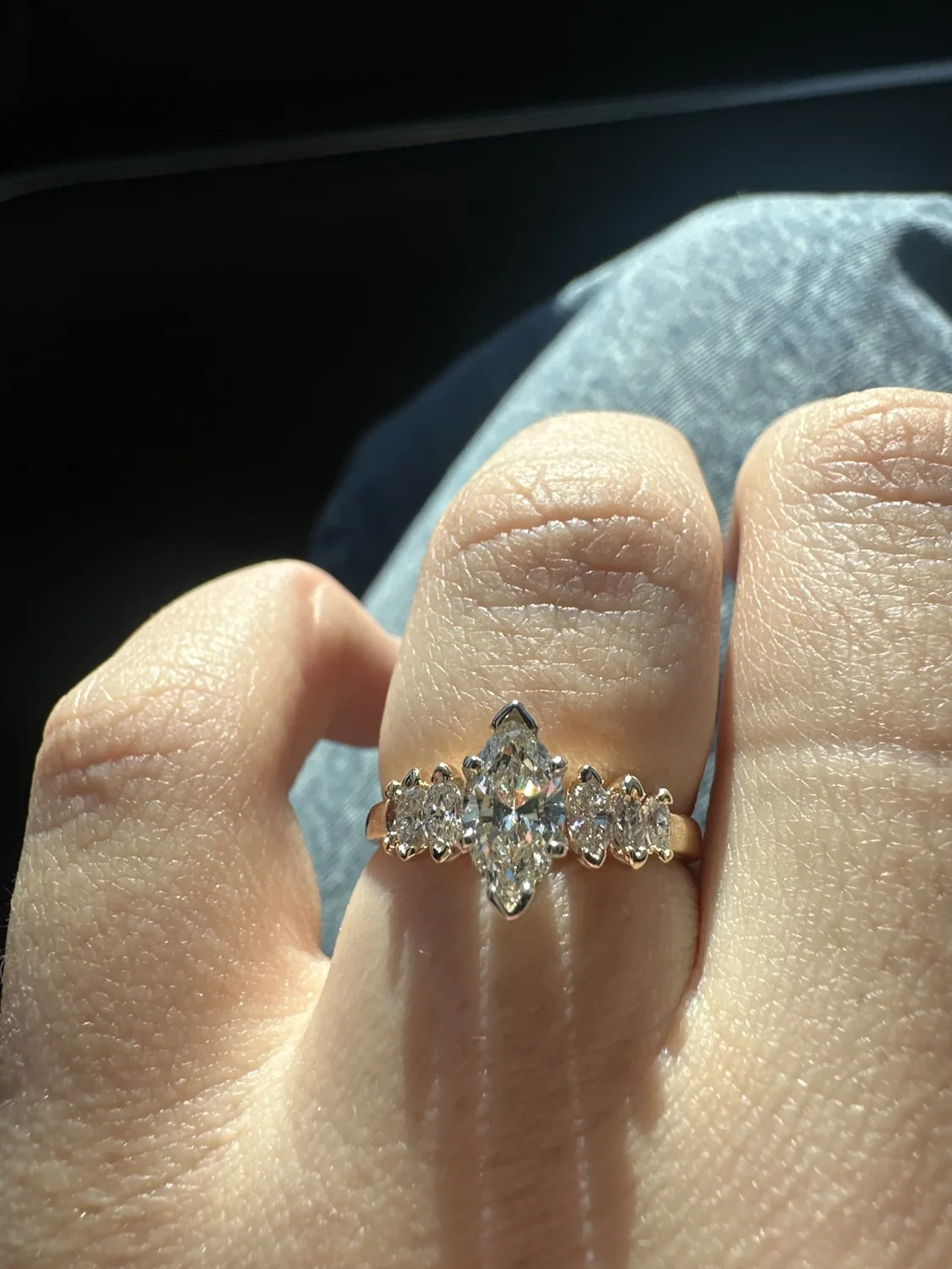 A finished marquise-cut diamond ring made by Vandenberg Jewelers